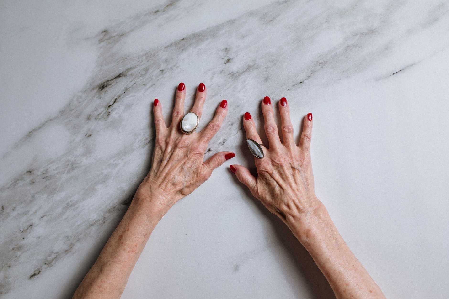 person with white nail polish